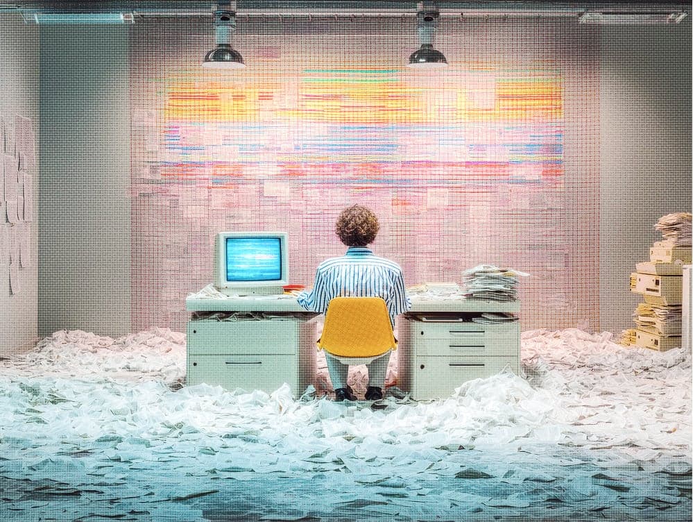 Person working at a computer representing the old way of PR reporting